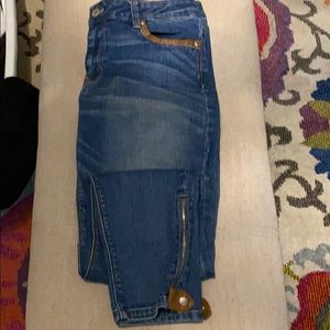 Leather accent ankle jeans